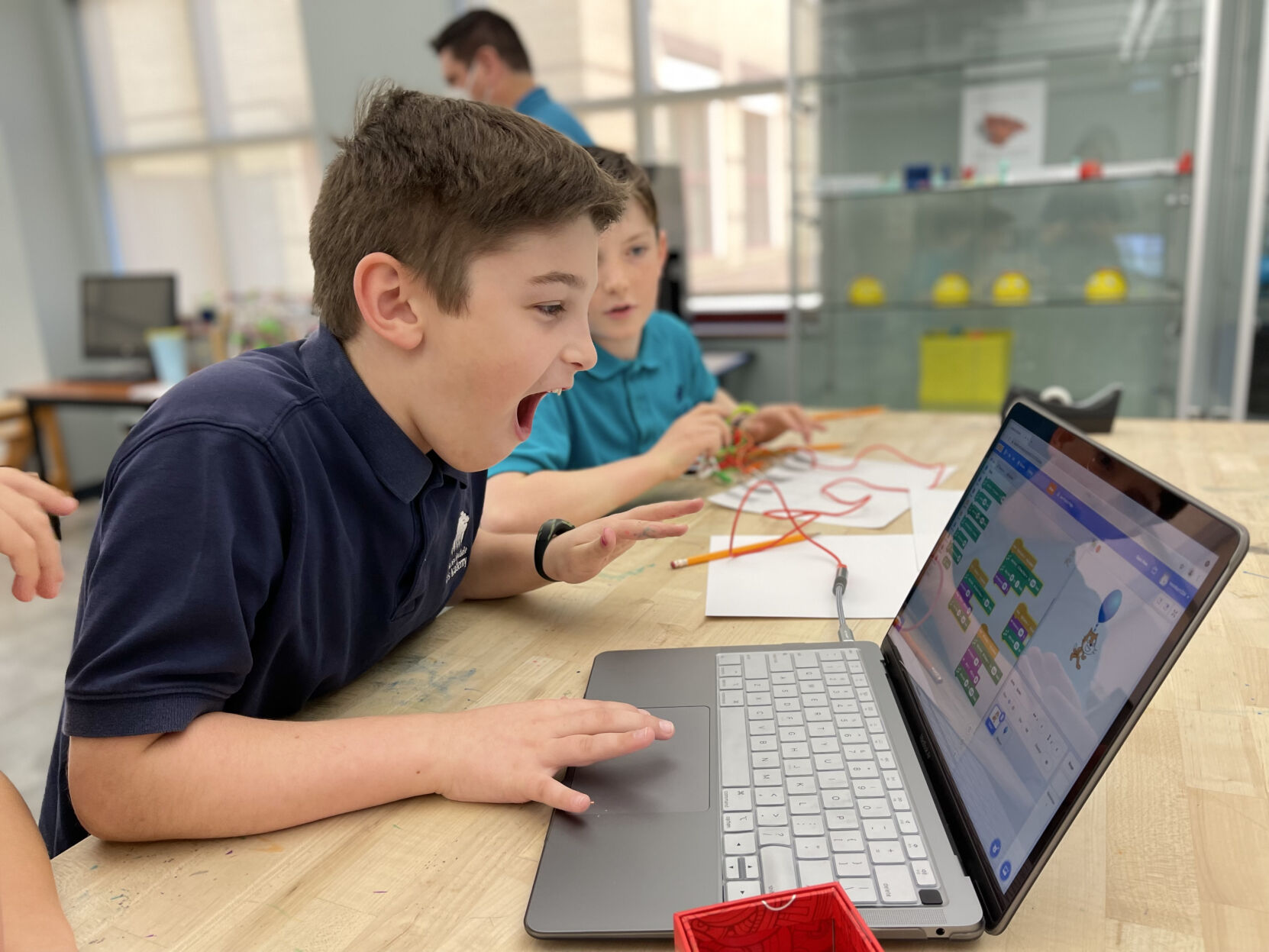 Student on computer having fun